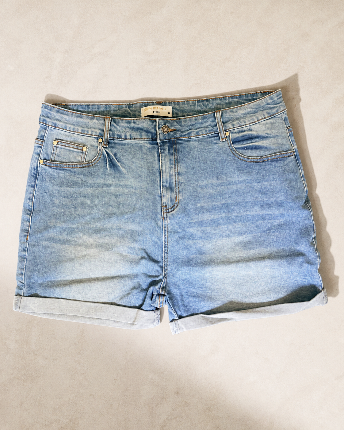 Cadeau light wash shorts, front view
